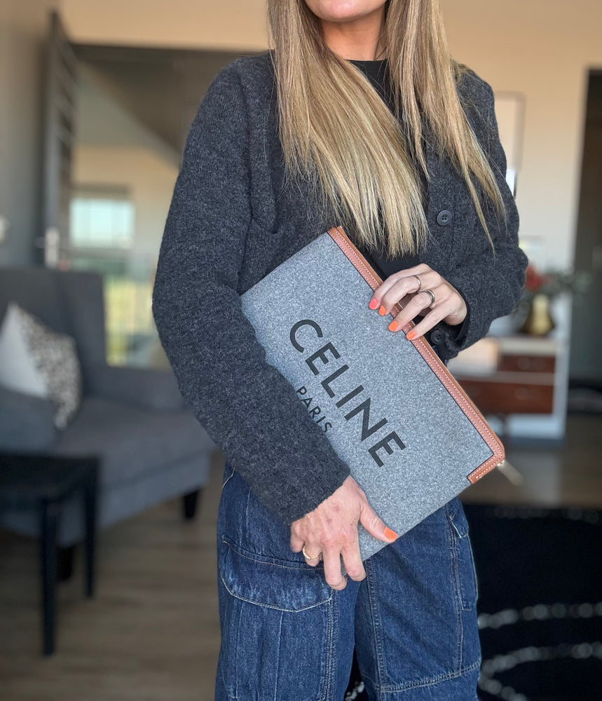 Celine logo clutch sale